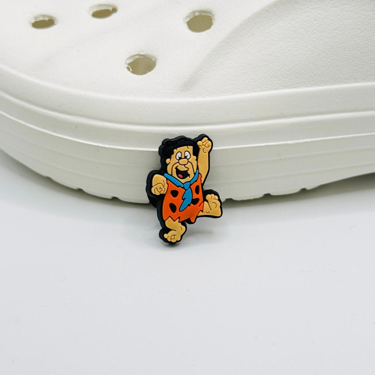 Flinstones shoe charms for Crocs-style clogs